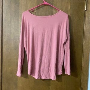 Blush colored long sleeve open back top